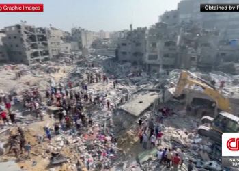 Airstrikes blast UN shelters, official says, as Israel announces complete encirclement of Gaza city