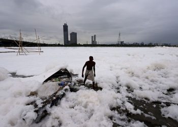 Toxic foam coats sacred river near New Delhi as Indian capital battles hazardous pollution