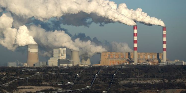 Countries’ emissions plans put the world ‘wildly off track’ to contain global heating, UN assessment shows