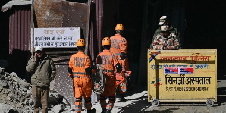 Indian rescuers dig past halfway mark in efforts to reach trapped workers