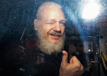 Squad and Marjorie Taylor Greene join 16 lawmakers calling on Biden to free Julian Assange