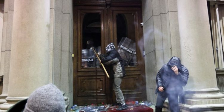 Demonstrators try to storm Belgrade city hall in protest against ‘stolen’ Serbian elections
