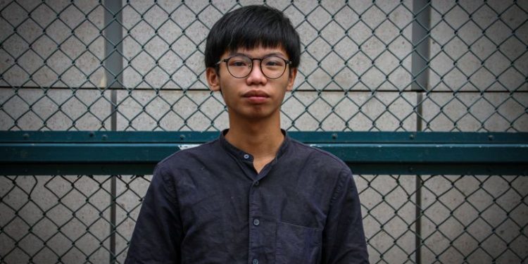 Hong Kong activist flees to UK citing ‘stringent surveillance’ by national security police following his prison release