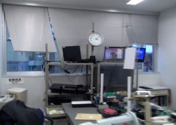 Earthquake survivors in Japan sleep in coats and hats at shelters without heat or running water