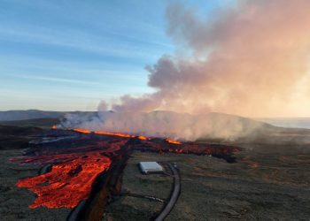 Buildings burn as lava from Icelandic volcano eruption flows into evacuated fishing town