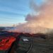 Buildings burn as lava from Icelandic volcano eruption flows into evacuated fishing town
