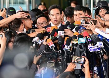 Thai court dismisses media shares case against popular progressive politician – but party’s future still in doubt