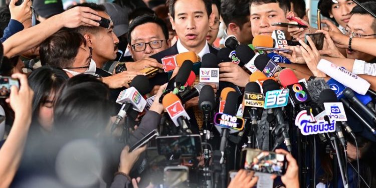 Thai court dismisses media shares case against popular progressive politician – but party’s future still in doubt