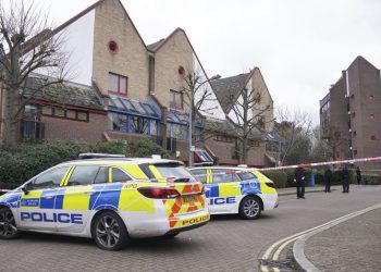 London police shoot dead man allegedly armed with crossbow