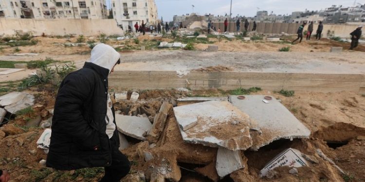 Israel says it is exhuming bodies in Gaza to determine if they’re hostages