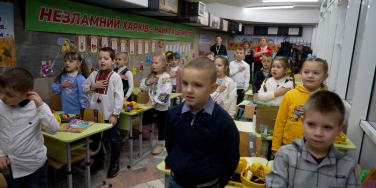 ‘We won’t hear the bangs’: Ukrainian city moves schools into metro stations