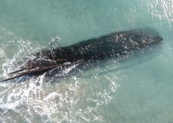 A fierce storm uncovered a mysterious shipwreck. Now another could destroy it