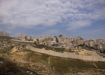Palestinian boy with firework, 12, shot dead by Israeli border police at east Jerusalem refugee camp