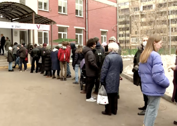 Russia sees polling station protests as Putin set to extend long rule