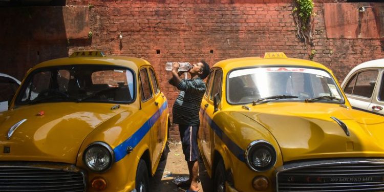 Indian voters battle extreme temperatures as intense heat wave hits region