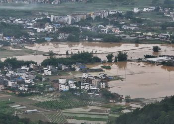 Massive floods threaten tens of millions as intense rains batter southern China