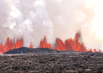 Iceland volcano dramatically erupts again as streams of lava reach town’s defensive walls