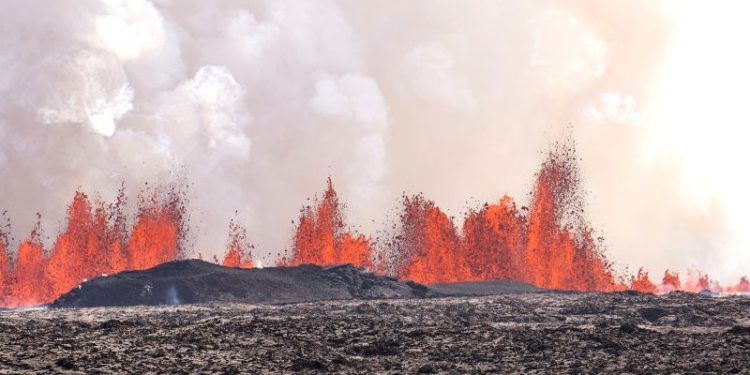 Iceland volcano dramatically erupts again as streams of lava reach town’s defensive walls
