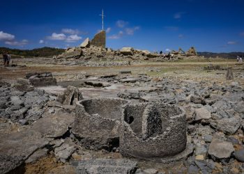 A 300-year-old settlement resurfaces as severe drought dries up a dam in the Philippines
