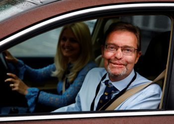 UK lawmaker who lost four limbs to sepsis returns to Parliament