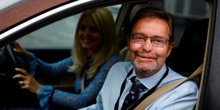 UK lawmaker who lost four limbs to sepsis returns to Parliament