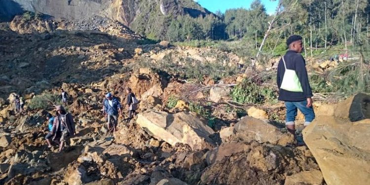Rescuers scramble to reach remote region of Papua New Guinea hit by deadly landslide