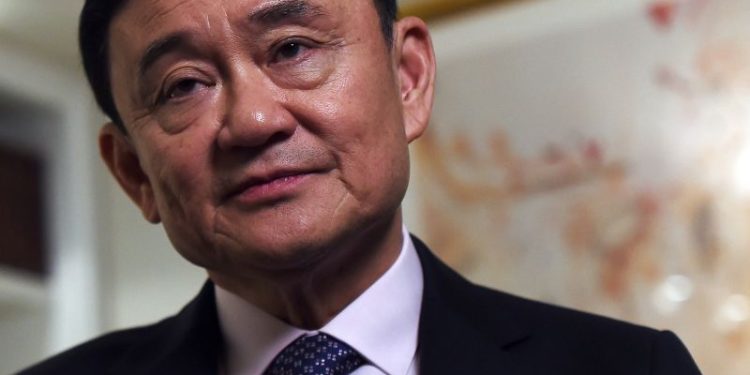 Thailand indicts former leader Thaksin Shinawatra on royal insult charges