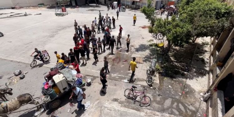 At least 10 people killed in drone attack on Gaza school used as shelter