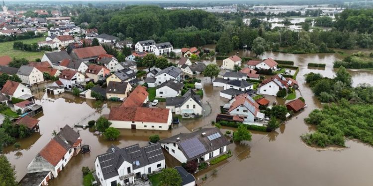 Rescue worker dies, several thousand evacuated in southern Germany floods