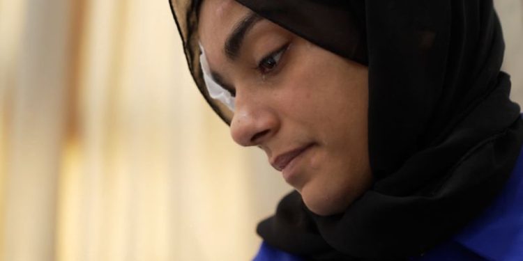 She managed to flee Gaza after half her family was killed in an Israeli strike. She blames Israel and Hamas for what happened