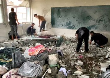 Israeli airstrike kills dozens sheltering in UN school, Gaza officials say