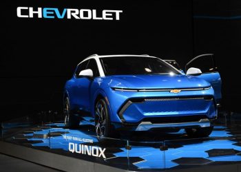 GM slows its EV plans again even as sales grow