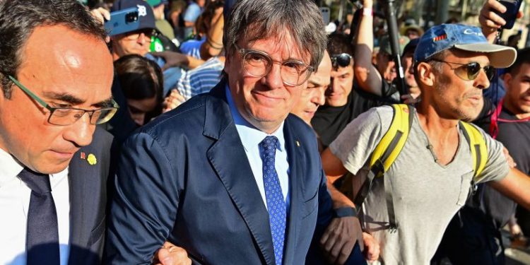 Wanted Catalan separatist Puigdemont reappears in Spain to rally supporters then vanishes again