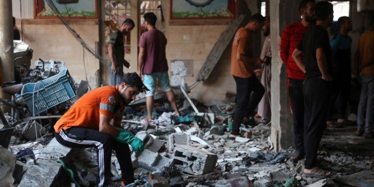 At least 90 Palestinians killed in Israeli school strike, Gaza officials say