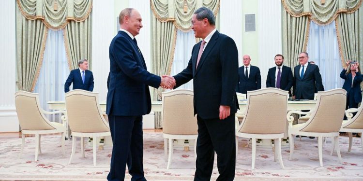 Russia’s Putin and China’s No. 2 official praise deepening ties as Ukraine war grinds on