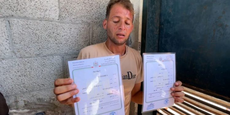 A Gazan father went to register his twins’ births. They were killed in an Israeli airstrike, hospital officials say