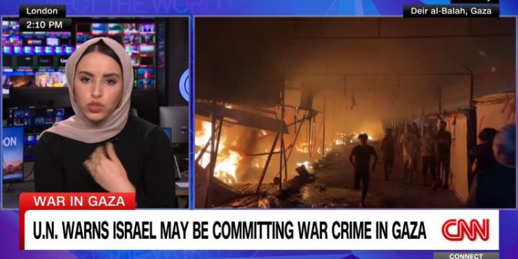 Stray dogs are eating the dead in the streets of northern Gaza, emergency services chief says