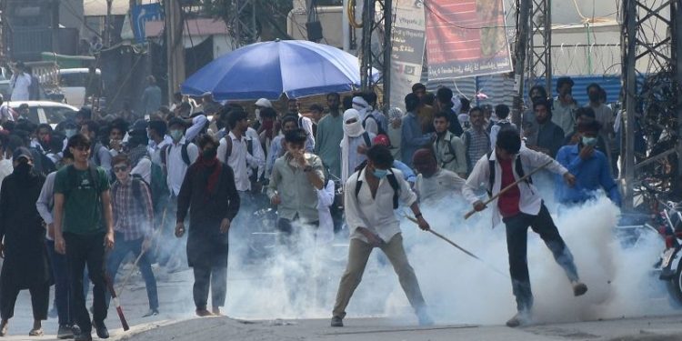 Pakistani police fire tear gas at protesting students as anger spreads over alleged on-campus rape