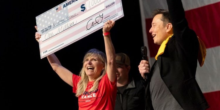 DOJ warns Elon Musk’s America PAC that $1 million giveaway may break the law