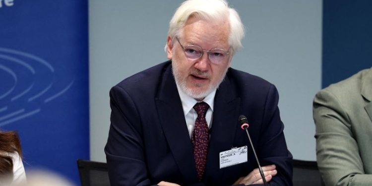 Julian Assange says he pleaded ‘guilty to journalism’ to secure his freedom in first public remarks since leaving prison