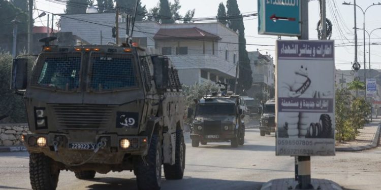 Israeli attacks in West Bank killed at least eight people, officials and residents say