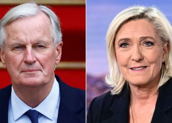 French lawmakers push through no-confidence motion that could topple government