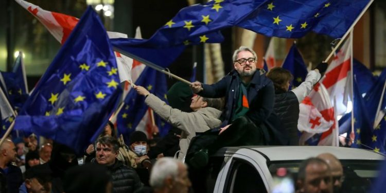 Georgian opposition politician beaten unconscious by police, party says, as government crackdown intensifies