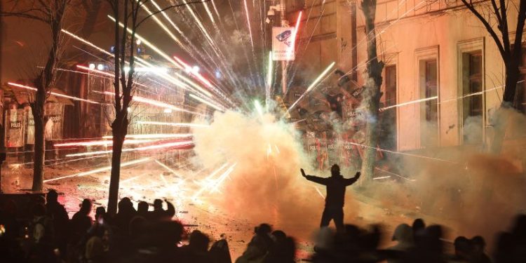 Protests in Georgia spread as PM defies US condemnation