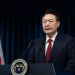 South Korea’s ruling party backs impeachment as president refuses to step down over martial law