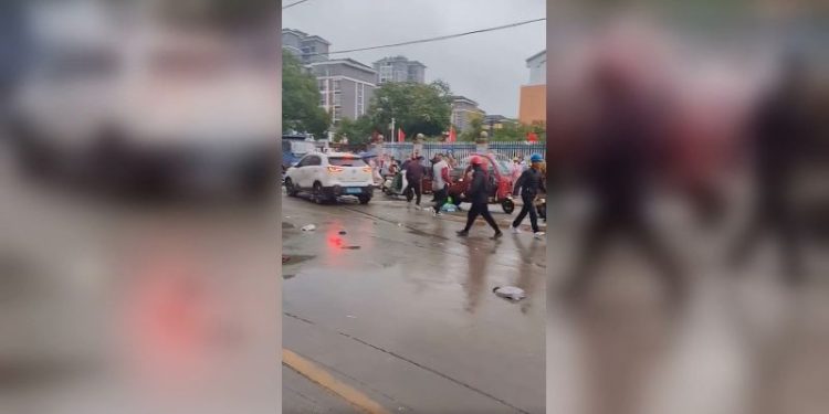 Driver who plowed into school crowd in southern China given suspended death sentence