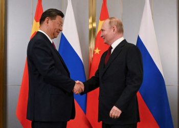 Xi and Putin hail tightening ties in call hours after Trump inauguration