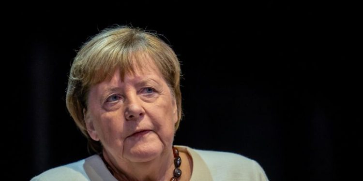 Merkel criticizes leader of her own party for cooperating with German far right