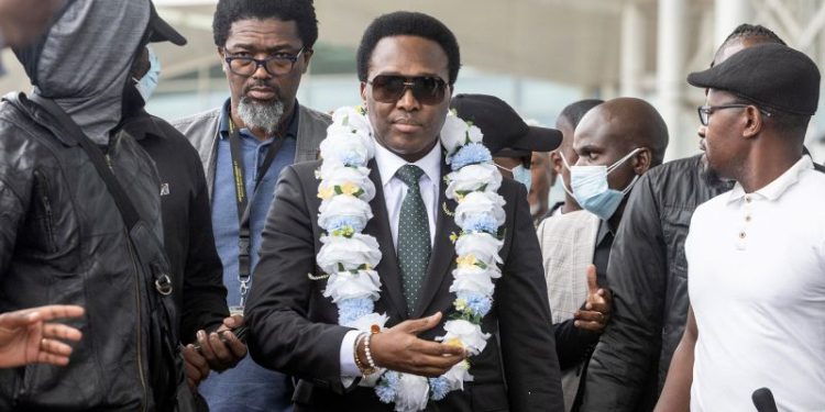 Mozambique opposition leader returns from exile as police fire tear gas at his supporters