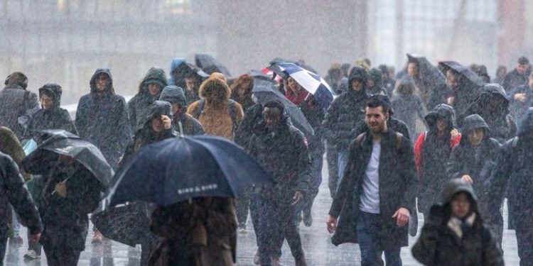 Severe storm lashes parts of UK and Ireland, causing travel chaos